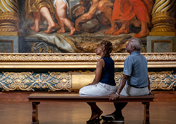 Photo of a couple looking at a painting. Link to Life Stage Gift Planner Over Age 70 Situations. Photo of a couple looking at a painting. Link to Life Stage Gift Planner Over Age 70 Situations.