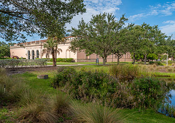 Photo of the museum grounds. Links to Request a Calculation